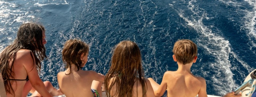 Family enjoying yacht cruise on the Mediterranean