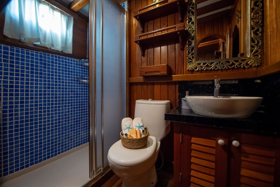 Northwind Gulet - Elegant Bathroom with Nautical Decor and Wooden Details