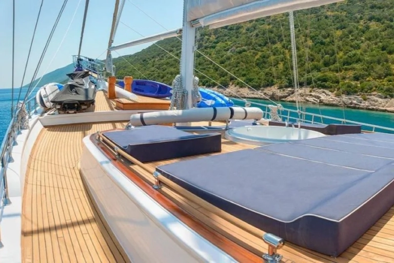 Jacuzzi and multiple sunbathing areas on Dolce Mare's upper deck