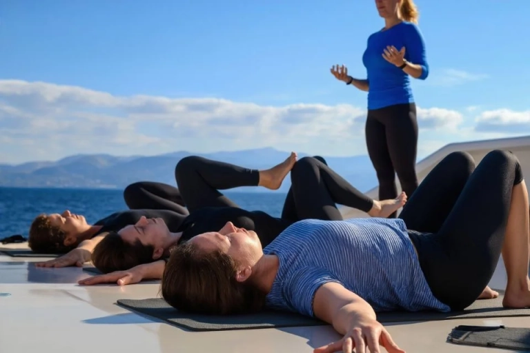 group-yoga-session-on-deck